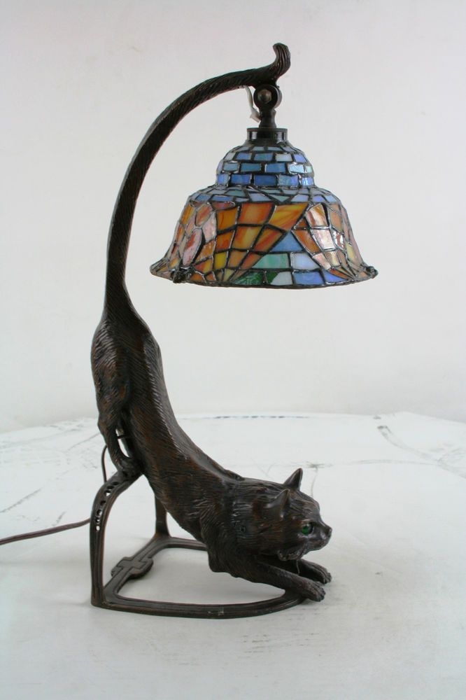 Bronze tiffany style cat lamp with bat shade