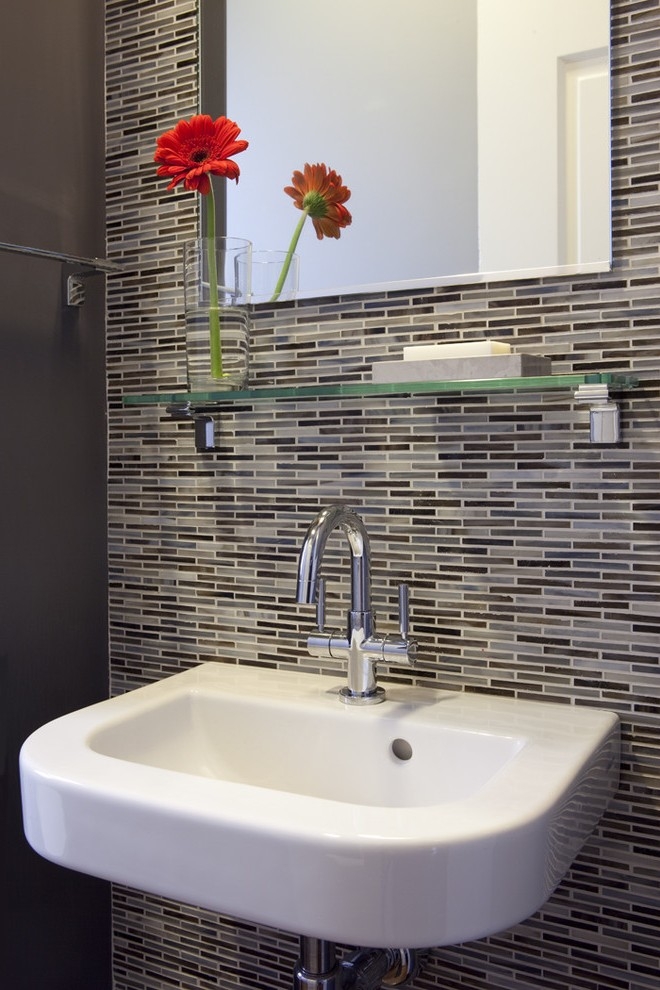 glass shelf above bathroom sink