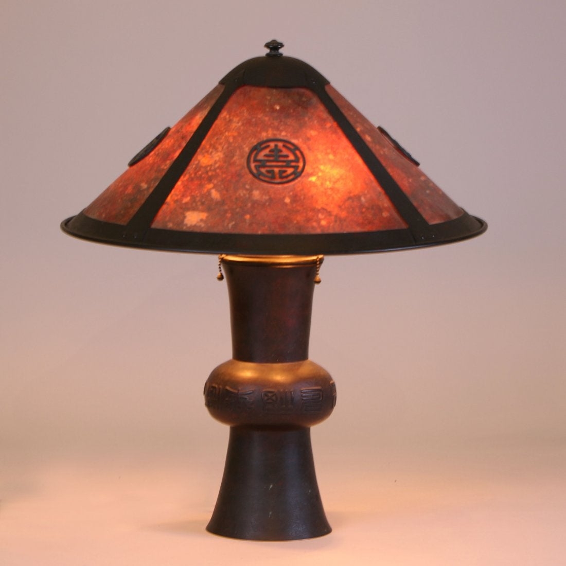 Large lillian palmer lamp with a japanese bronze base hammered