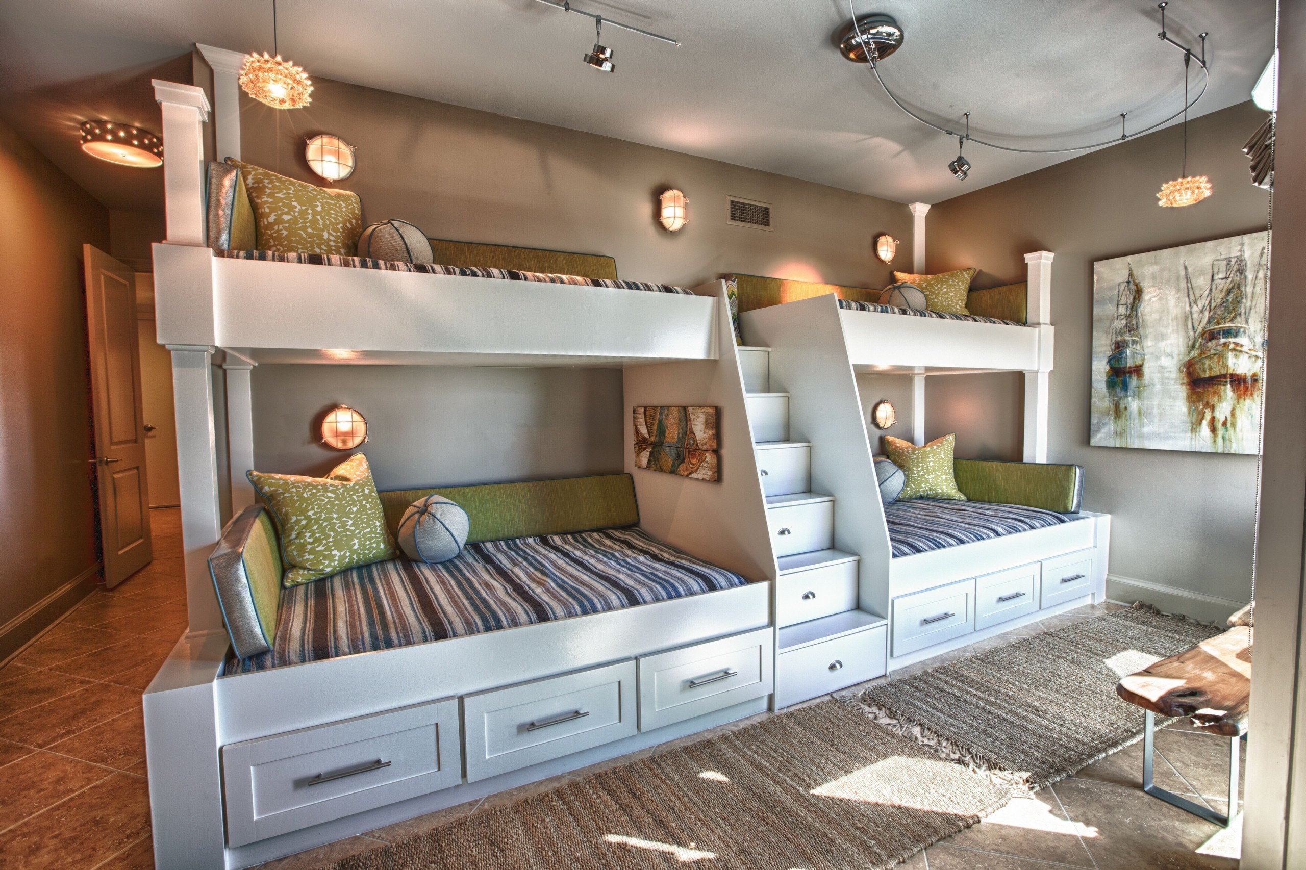 two bunk beds with desk