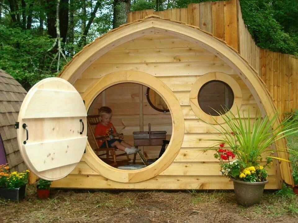 Hobbit hole playhouse with round front