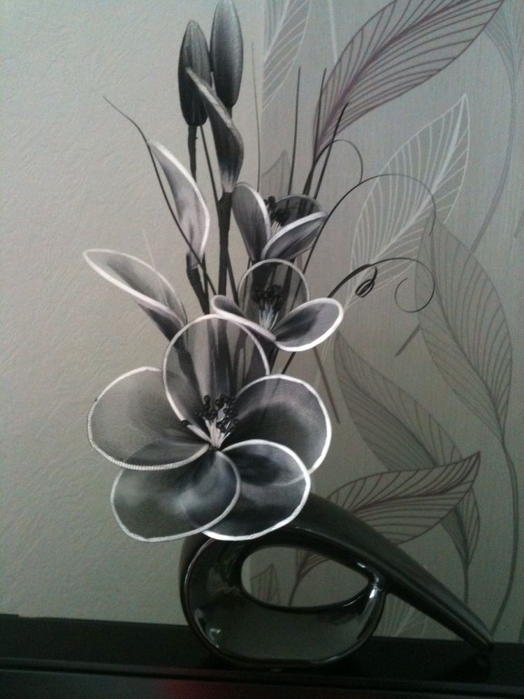 Artificial Flower Arrangement In Black White Nylon Flowers In Shaped Vase