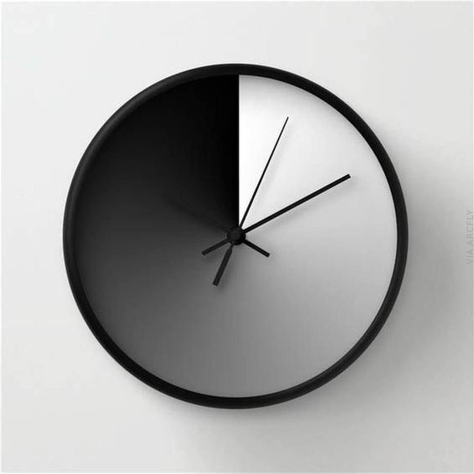 Modern wall clock midday and midnight