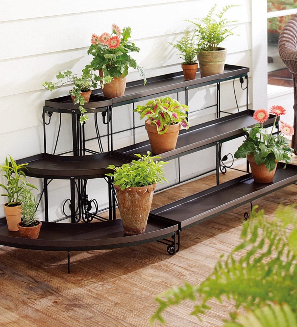 Tiered embellished steel plant stands and zinc plant stand liners