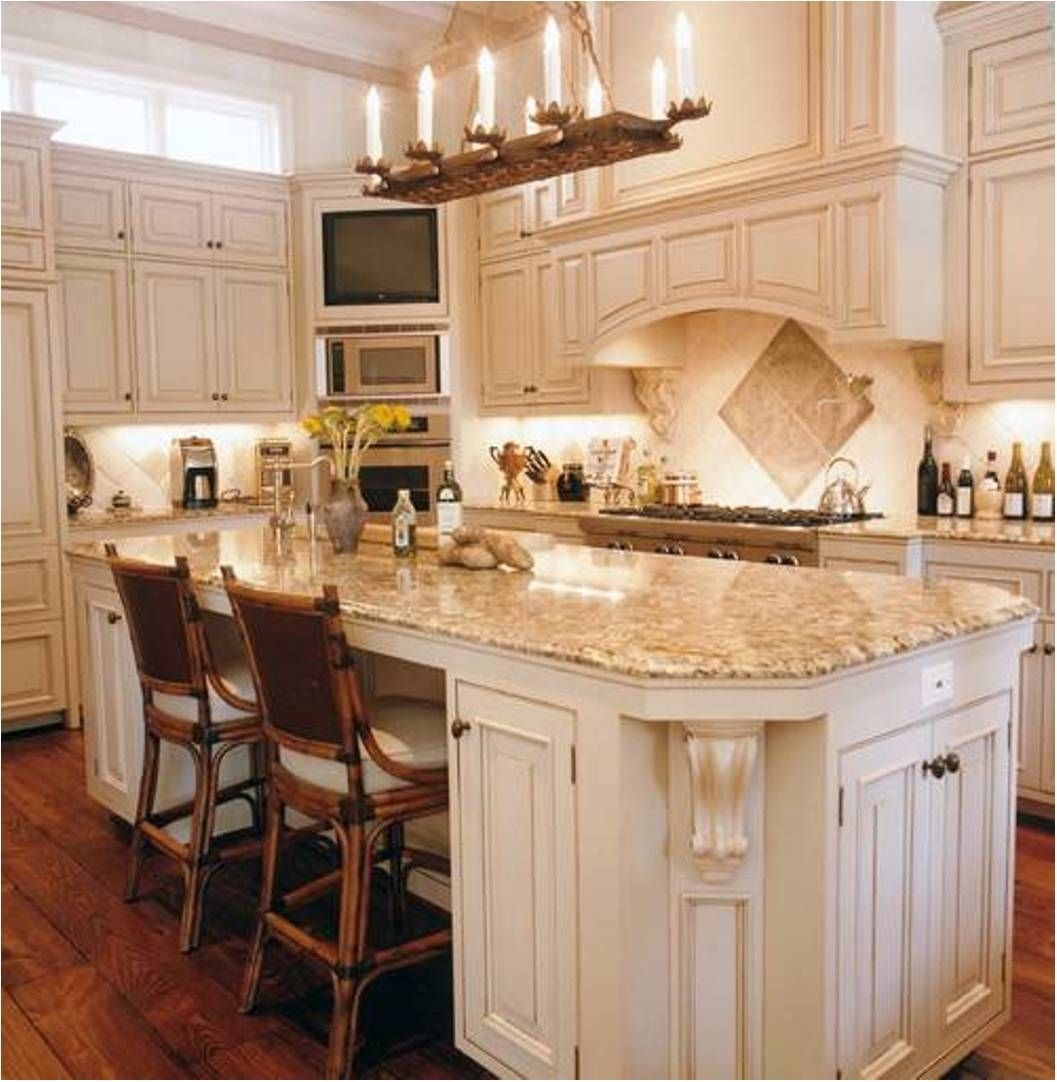 Kitchen design with white classic island combined cream granite top