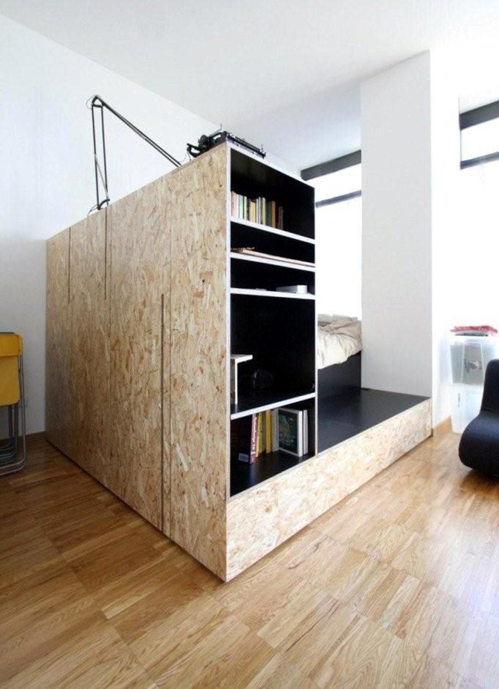 Bed with shelves around it