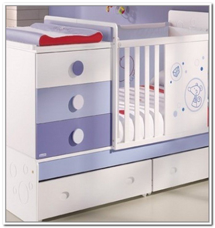 white crib with drawer underneath