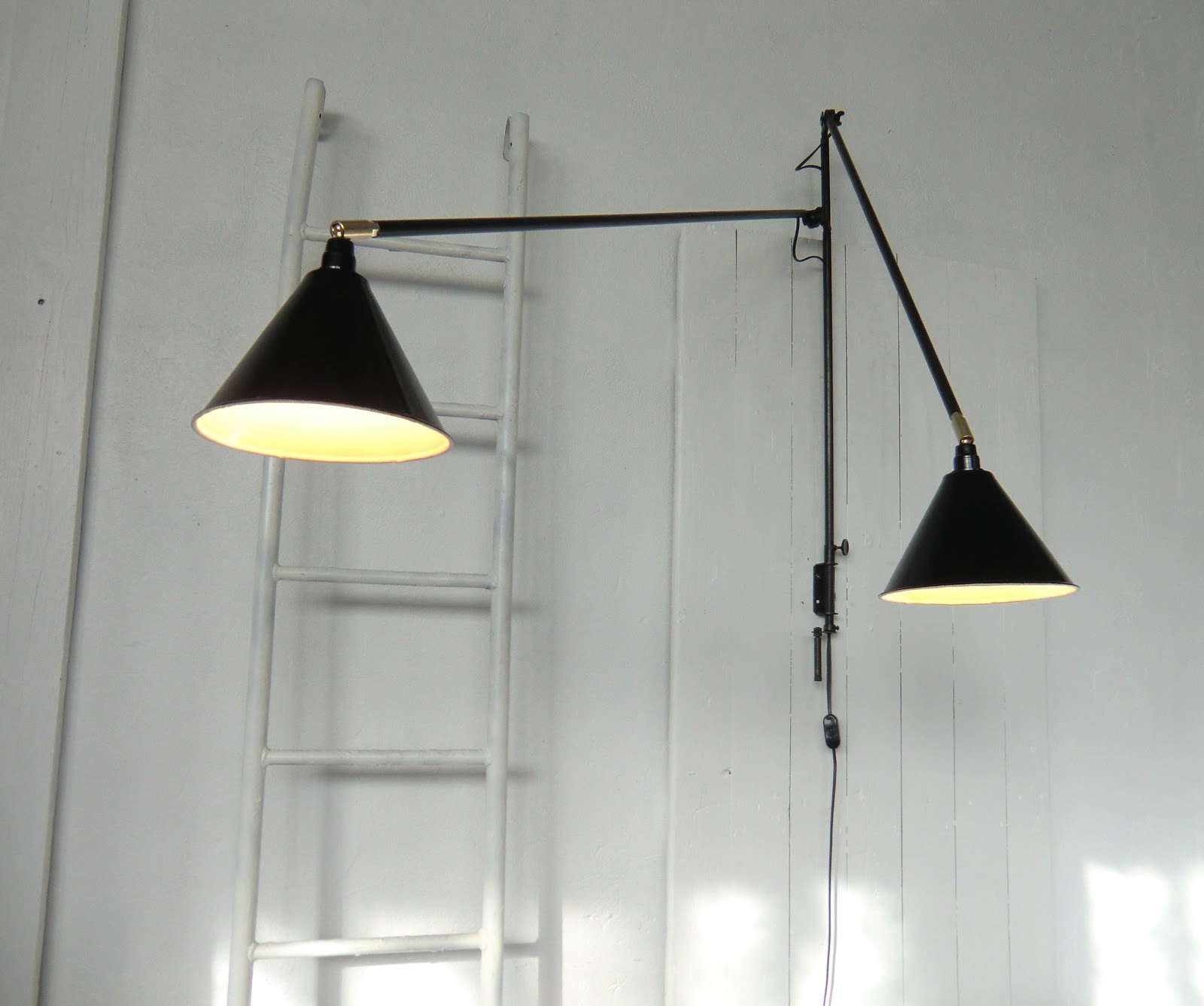 double swing arm wall light