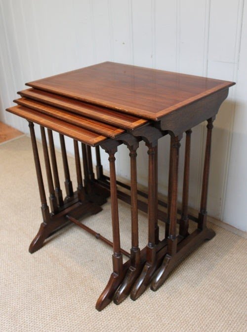 Antique mid 20th century walnut nest of four tables