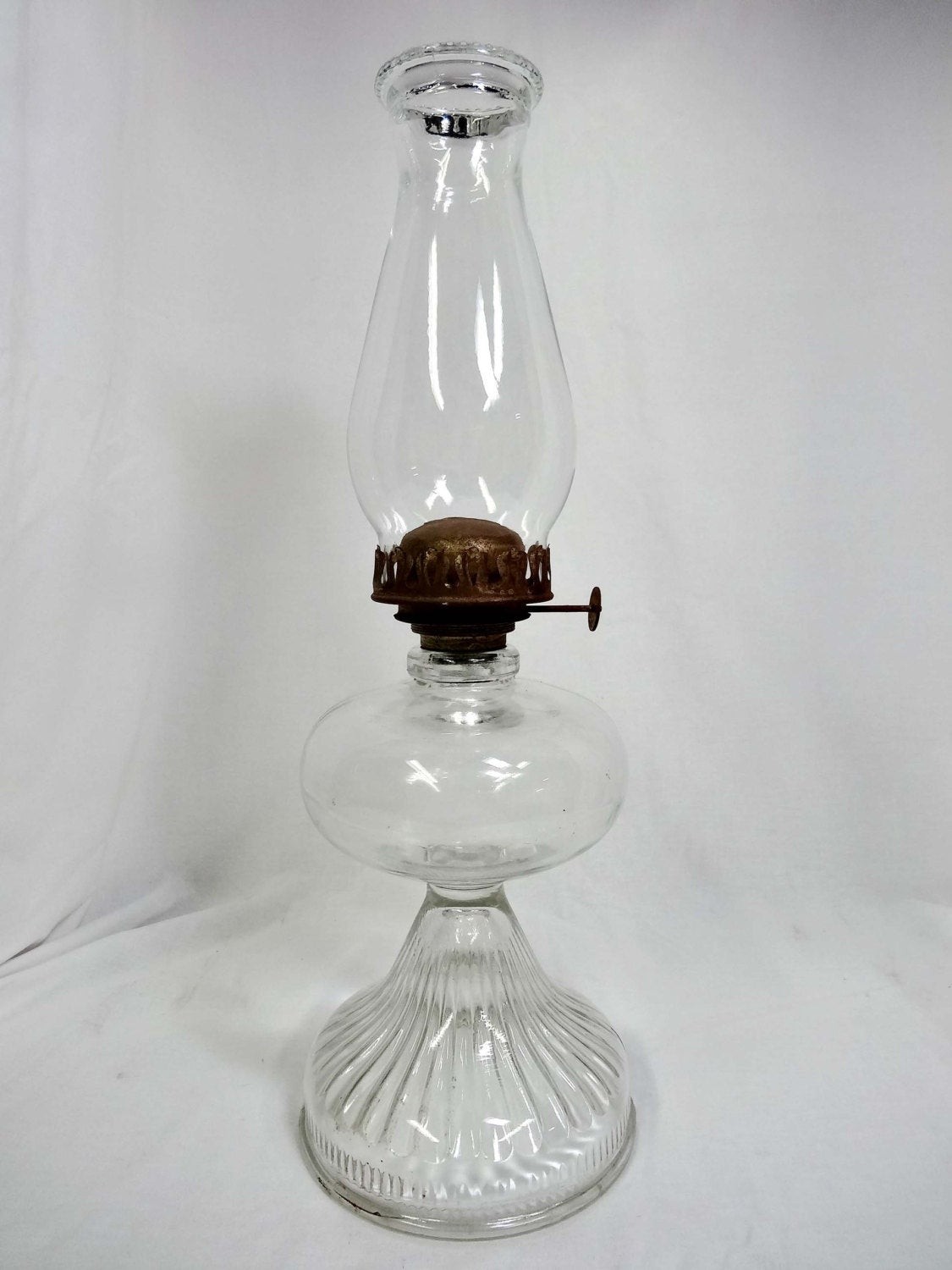 Clear glass hurricane oil lamp from the