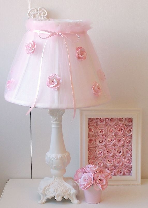 Lamp shade slip covered with sheer fabric then silk roses