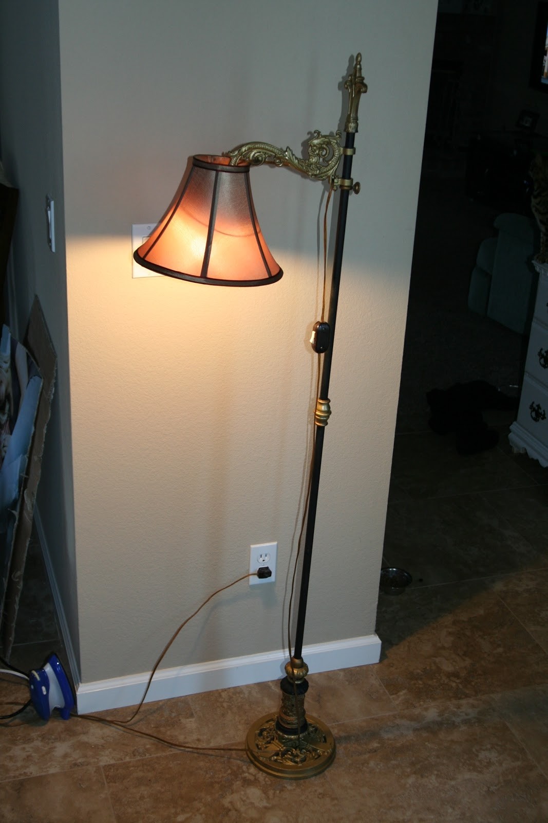 Description this vintage antique floor lamp is solid iron and