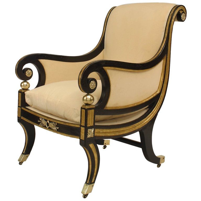 Early nineteenth century cream upholstered club chair composed of ebonized