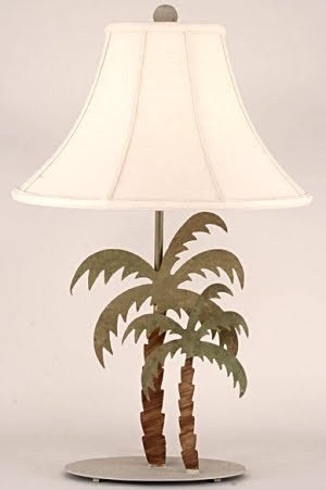 Palm tree table lamp with a white shade and a