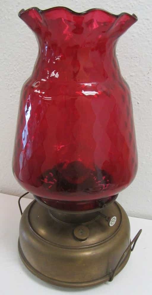 Brass oil lamp w original cranberry glass shade