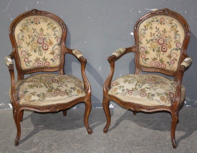 Antique pair of French Louis XV bergère chairs.