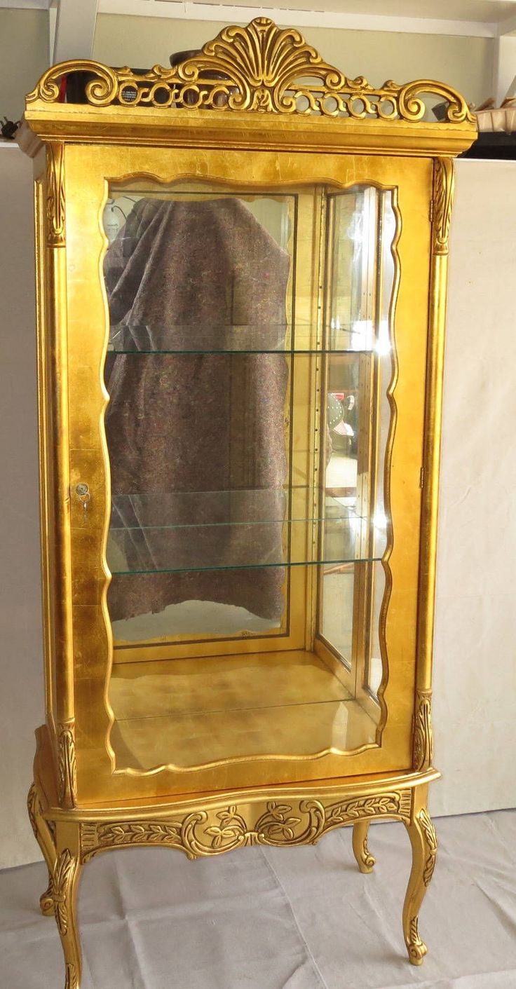 Antique gold deals curio cabinet