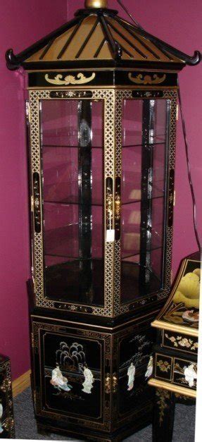 Oriental curio on sale display cabinet