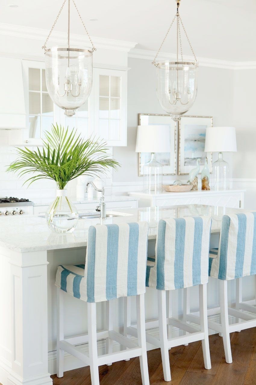 Striped slipcovers on the bar stools