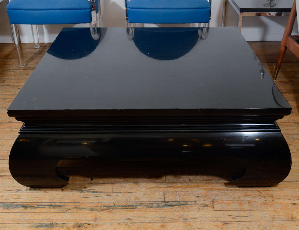Vintage low asian inspired coffee table with a black lacquered