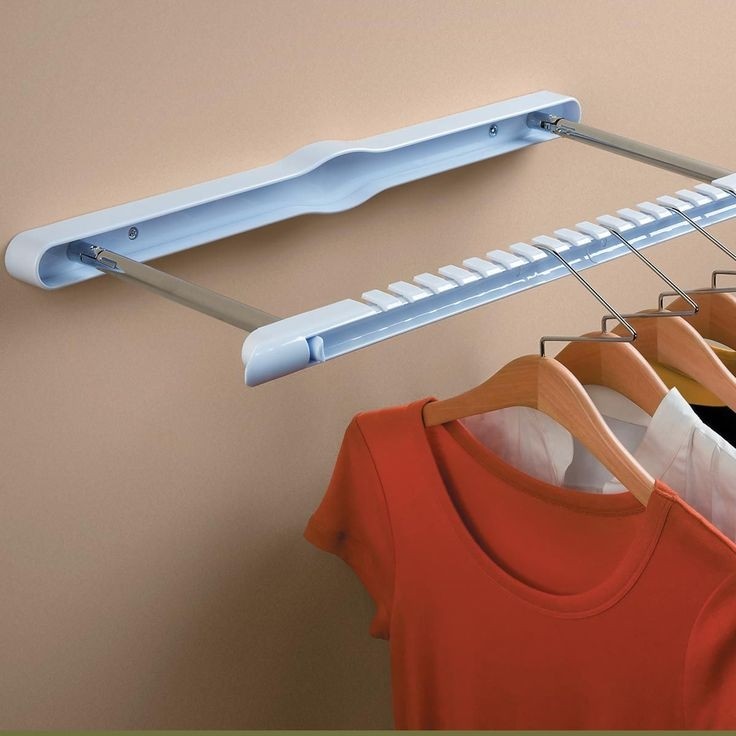 Hang n hide wall mounted garment rack