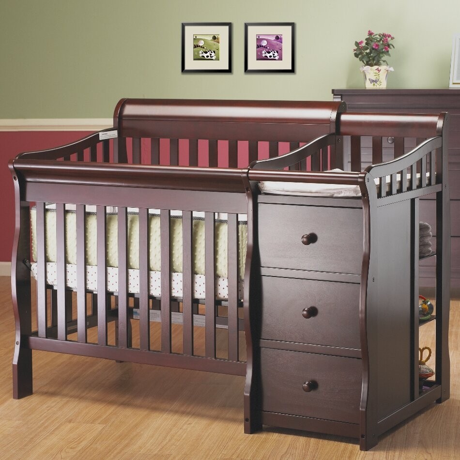 Crib with storage drawer underneath best sale