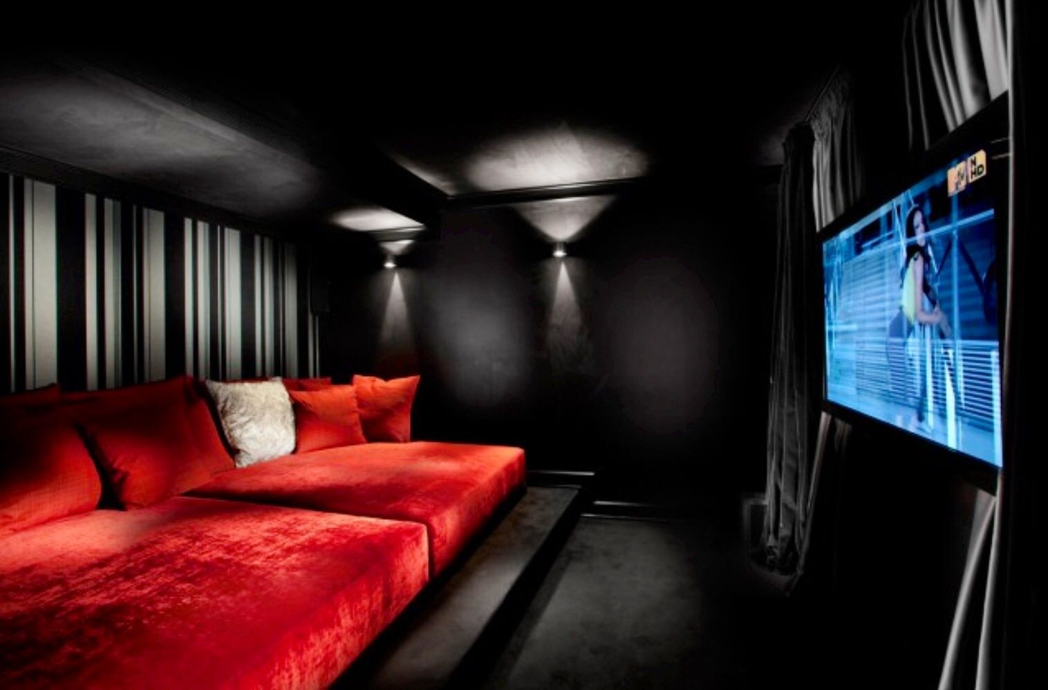 Inspirations elegant modern home cinema room with big red sofa