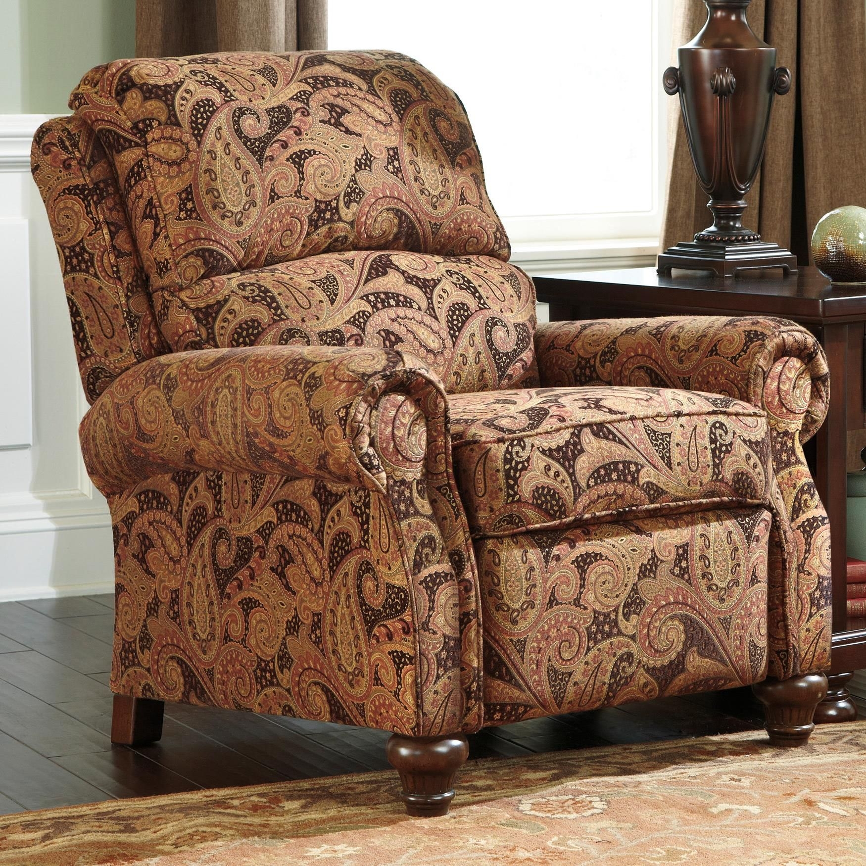 Traditional style upholstery features top grain leather plush rolled