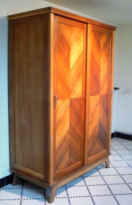 The new armoire in the entry hall