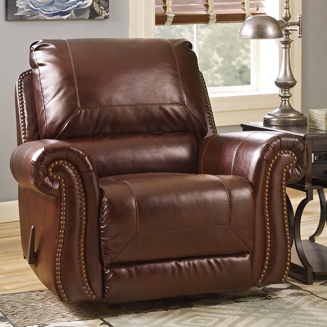 Leather match power rocker recliner with nailhead trim at regency