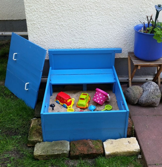 Upcycled DIY sandbox with cover