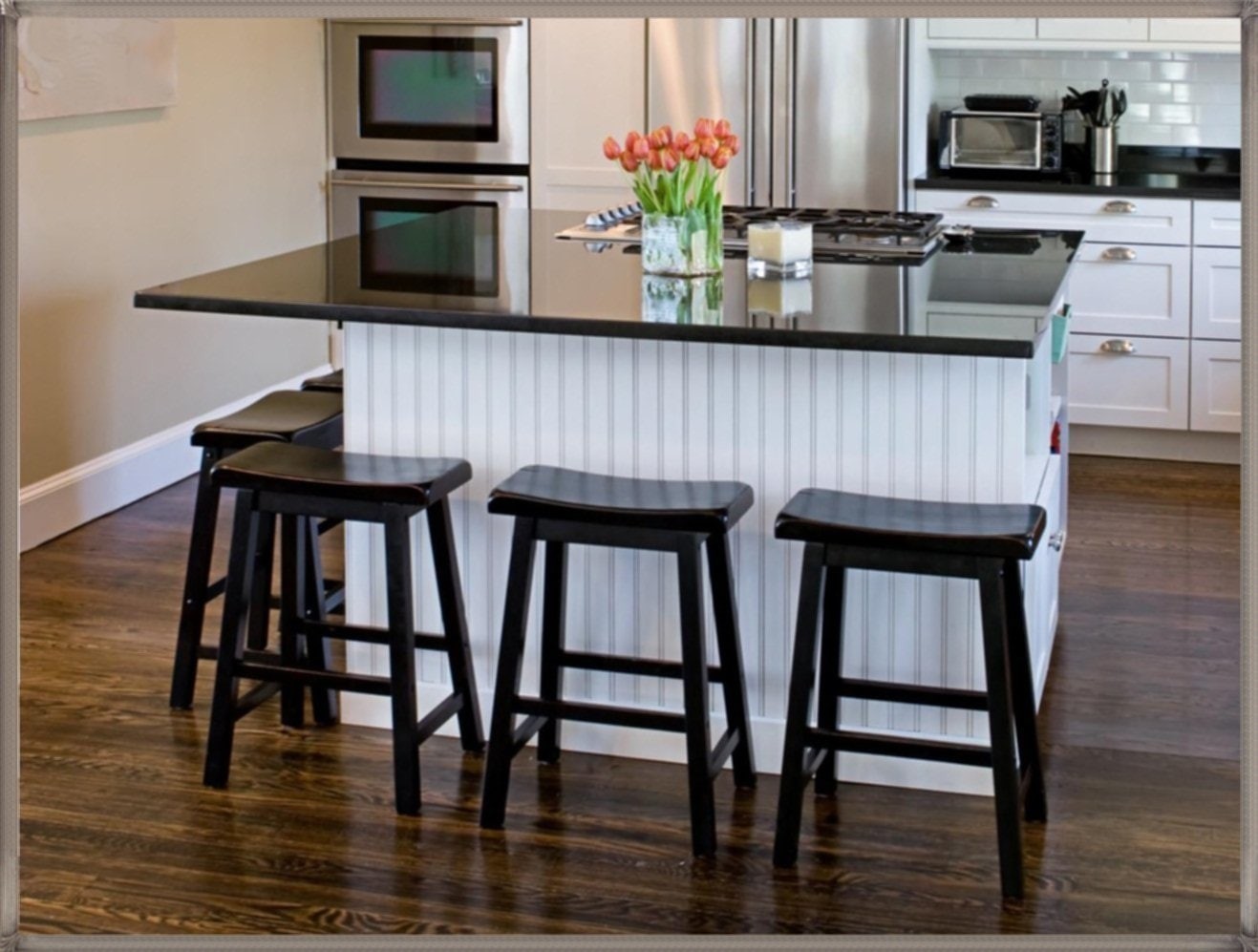 built in corner bar with stools in kitchen