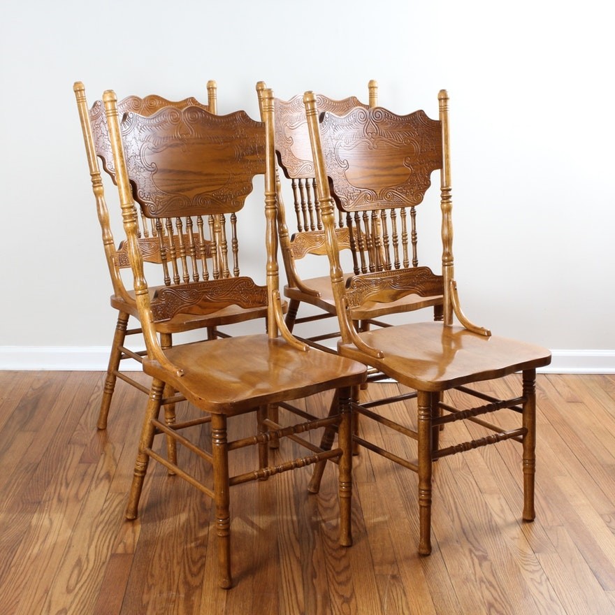 Vintage oak press back dining chairs ebth 1
