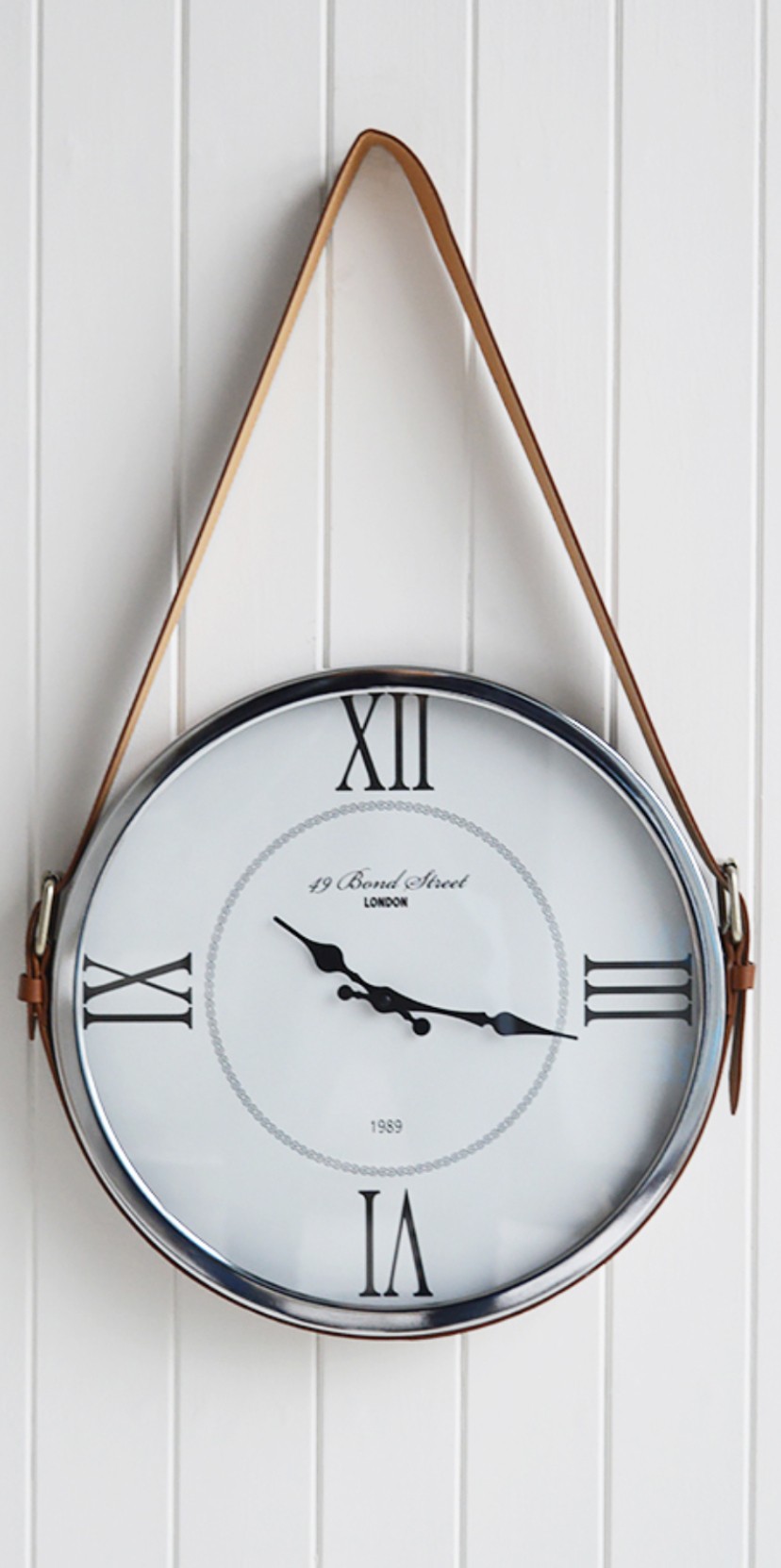 Wall clock with leather strap