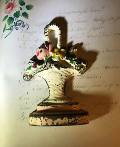 Antique hubley cast iron door stop flower basket late