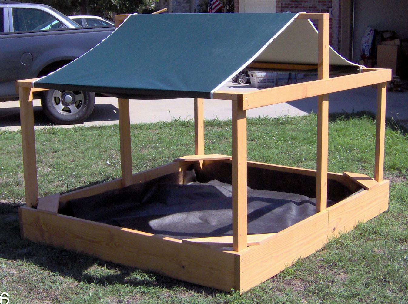 Brand new very large canopy sandbox with cover 6 feet