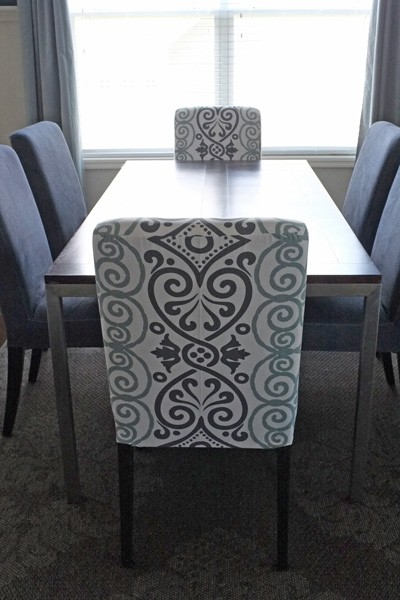 Diy dining chair slipcovers from a tablecloth