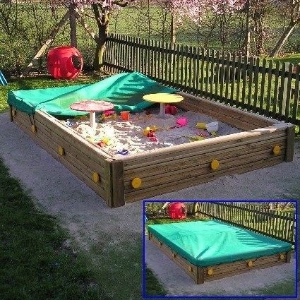 Open topped brighton sand box includes play tables and