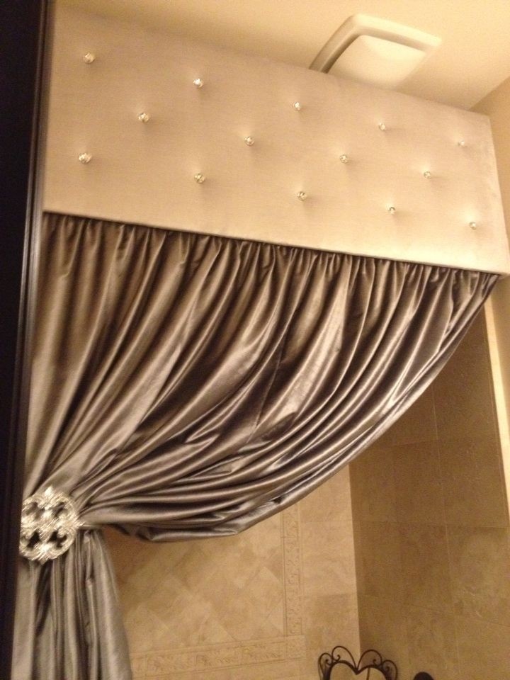 Rhinestone tufted cornice with silver tied back shower