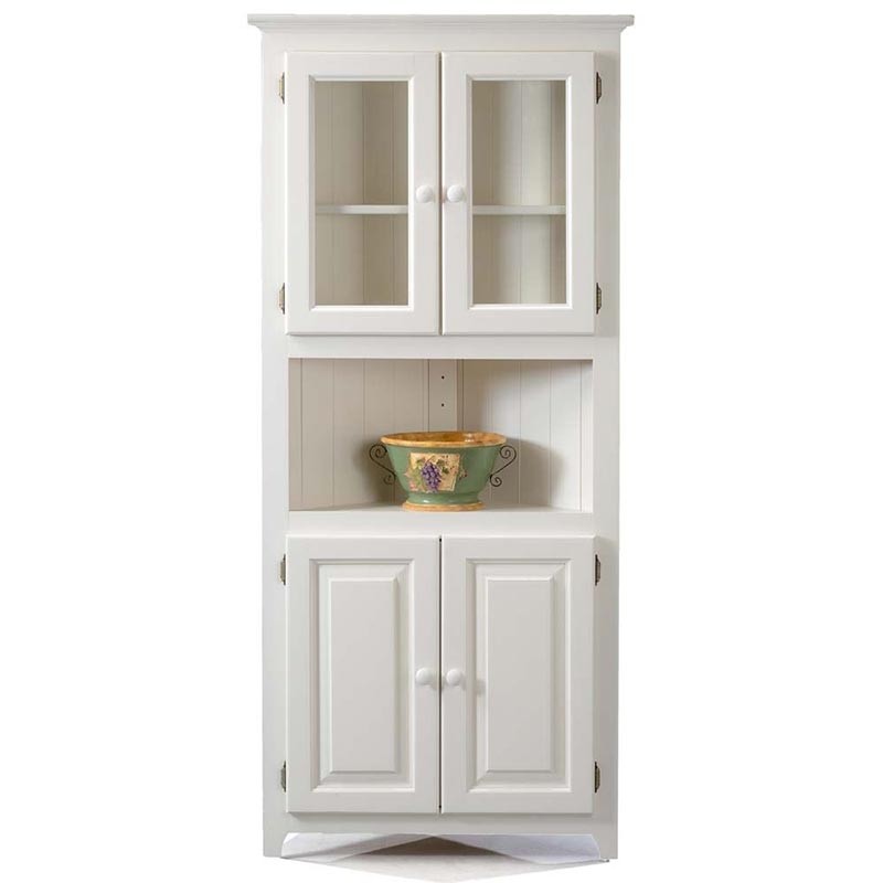 The solid pine corner cabinet features upper and lower doors