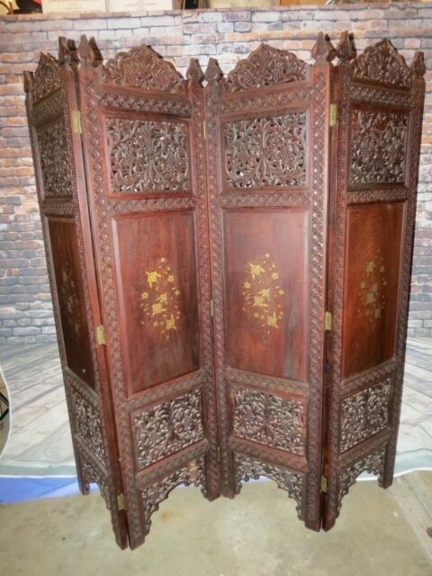 Traditional four panel wooden room divider with hand