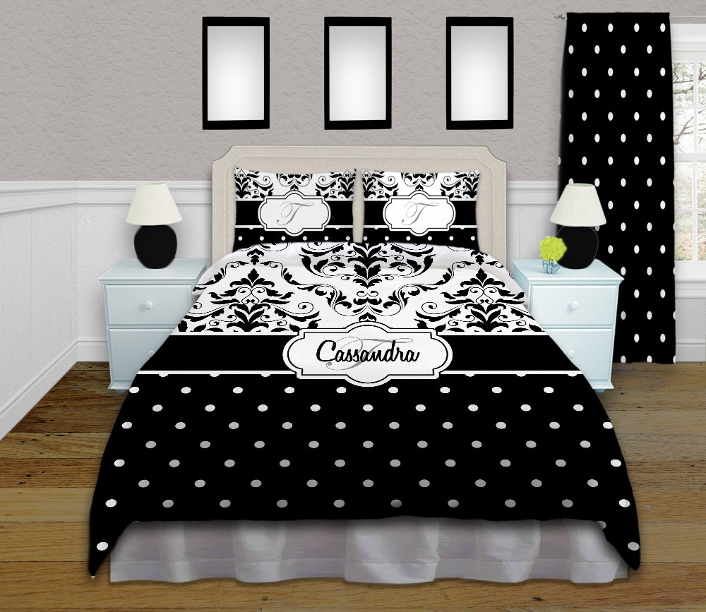 Black and white polka dot bedding with damask pattern