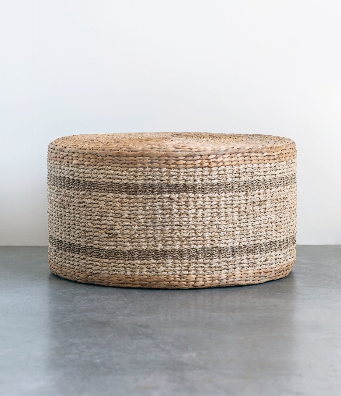 Brown striped round water hyacinth seagrass ottoman