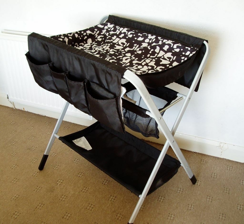 Ikea folding changing table with mat and mat covers in