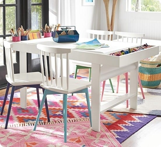 Kids art table with paper roll and storage