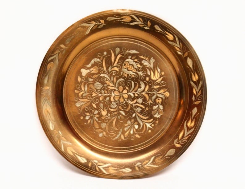 Large decorative etched copper wall plate with intricate 3