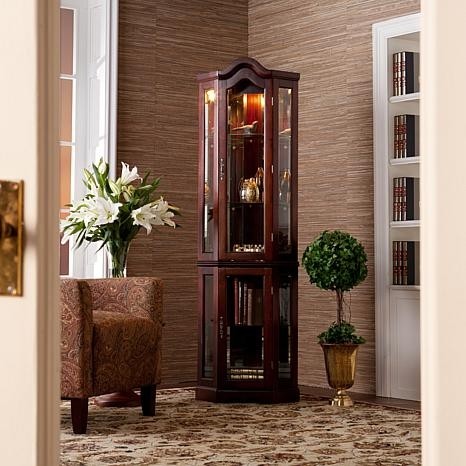 Lighted corner curio cabinet with mahogany finish