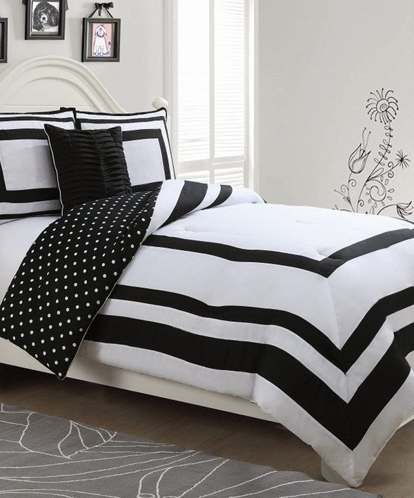 Look at this black polka dot reversible comforter set on