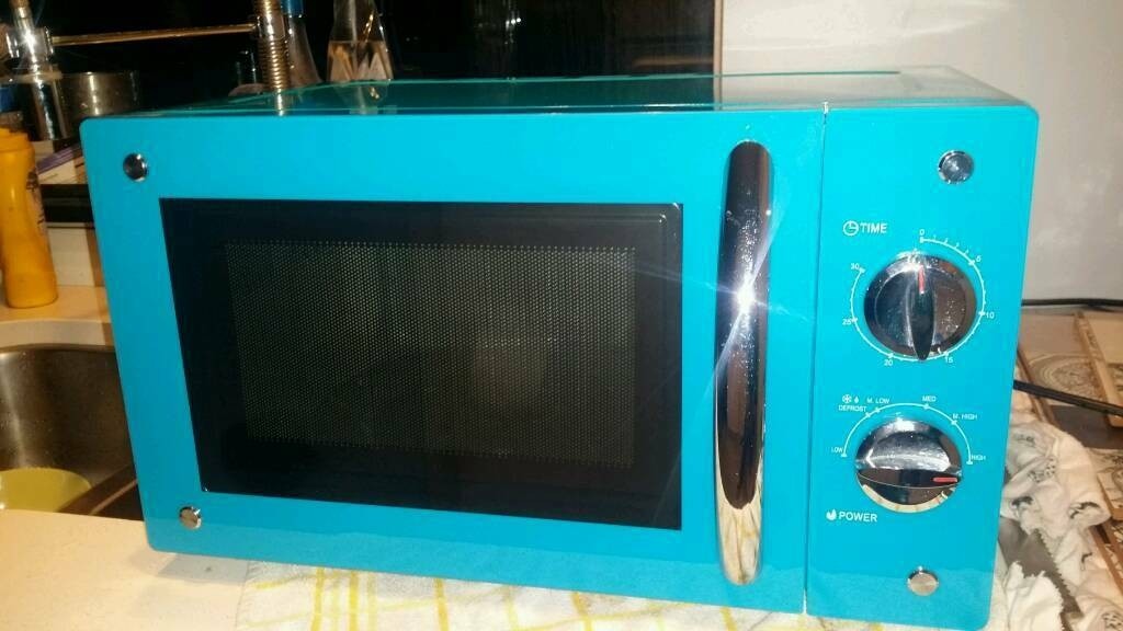 Microwave oven in teal blue colour in bournemouth
