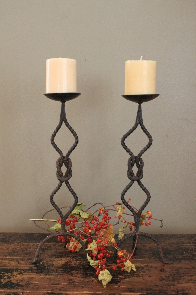 Pair of wrought iron antique candle holders by myvintagelane